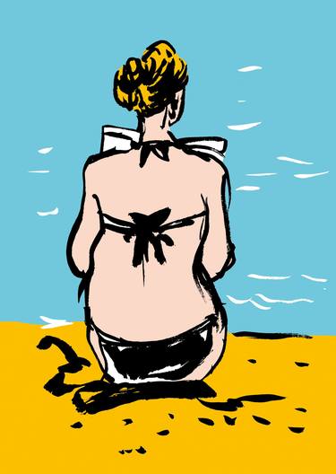 Woman reading on the beach thumb