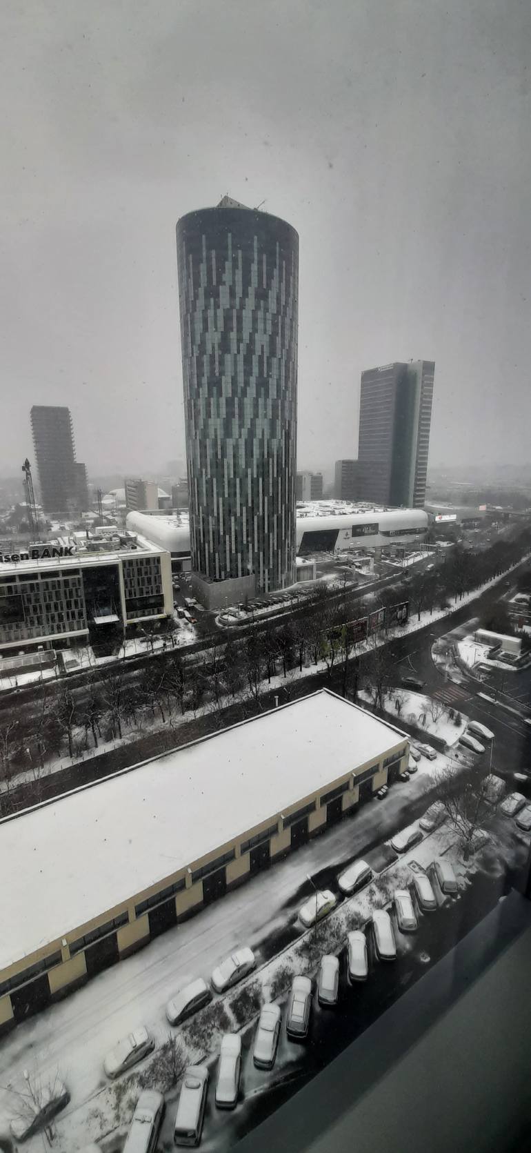 Original Architecture Photography by Stefan Juan | Photorealism Art on Paper | Sky Tower Floreasca in the middle of a winter storm