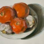 modern still life of tomatoes and garlic on white by olivier payeur