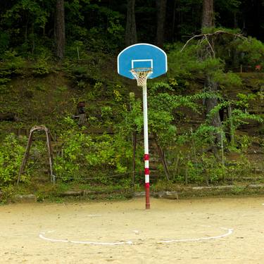 Basketball Court in Empty Children's Playground thumb