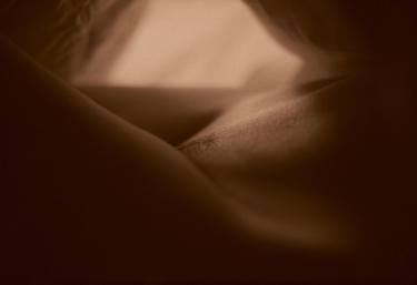 Sexy young lady nude in bed - Analog 35mm film photo in sepia thumb