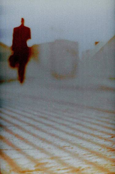 Man walking in city analog 35mm Lomo Smena vintage photo thumb