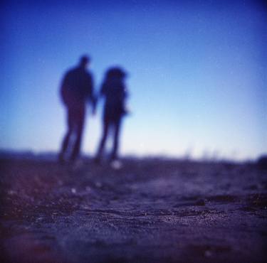  Romantic couple walking holding hands on beach in blue Medium format color negative film photo  thumb