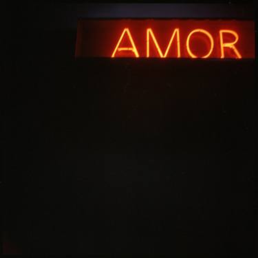 Neon light sign Amor love in Spanish on black medium format film analogue photo thumb