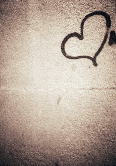 Love heart painted on urban city wall silver gelatin black and white 35mm negative analog film photograph thumb