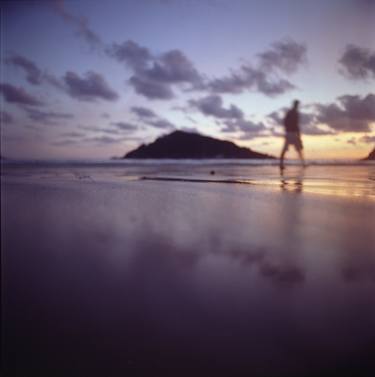Man walking on beach dusk sunset evening sky Hasselblad medium format film analogue photograph thumb