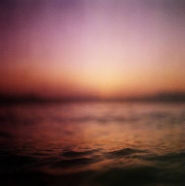 Coastal shoreline in surreal red purple pink sunset evening dusk colors Hasselblad medium format film analog photo thumb