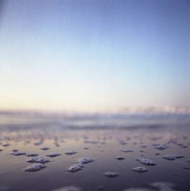 Coastal shoreline in square blue low tide sea water closeup macro medium format film analog photo thumb