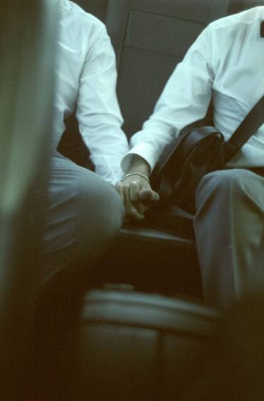 Gay wedding grooms hold hands in car c41 film fine art analog lgbt marriage photo thumb