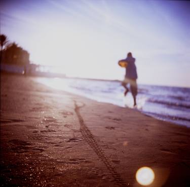 Boy running on beach square Lubitel lomo lomographic lomography medium format  color film analogue photo thumb
