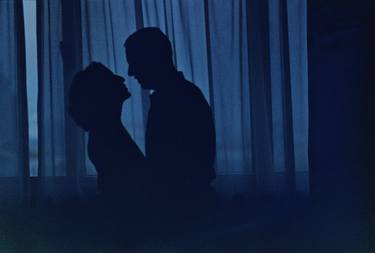 Blue silhouette couple kissing analogue film photograph thumb