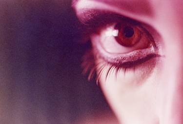 Surrealist eye of young lady with makeup analog photograph thumb