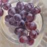 A nature of red grapes on glass plate. An interesting game of textures and soft colors. An enjoyment of painting.