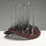 Tv through Grate by Theo Shields