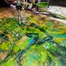 fusing each layer of encaustic with a gas torch
