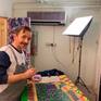 Artist in the studio working
