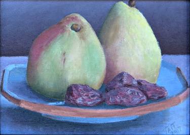 Comice pears and medjool dates on a blue dish thumb