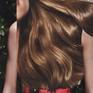 Glossy locks from a glossy magazine, conceal a glamour girl.
