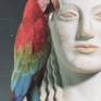 This classical beauty is hearing both sides of the story from these winged messengers.