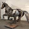This work is by commission only and requires 2-3 months to make. 
This sculpture portraits the graceful energy of a horse galloping, frozen at the moment where one foot is on the ground and all others are in the air. This is a handmade, hammered and welded stainless steel sculpture.