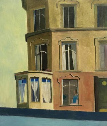 House with a woman behind a window thumb