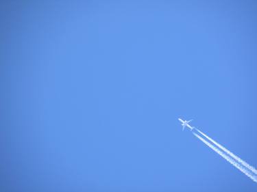 Print of Airplane Photography by Ieva Baklane