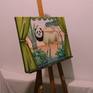 Side view of painting on the easel.