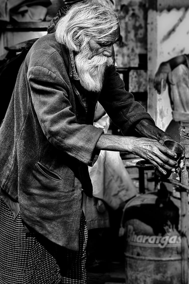 Original Travel Photography by Christophe Cham | Other Art on Aluminum | Old man pouring water - Limited Edition 1 of 5