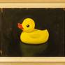 A loose painting of a Rubber Duck.

This Original Oil Painting is finished with a high quality removable semi-gloss varnish. This painting arrives ready to hang via the pictured 3″ Plein Aire Gold Leaf wooden frame secured by 30lb wire and d-rings
