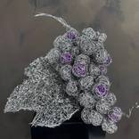 A Grape cluster with one leaf and purple by Maya Taneva