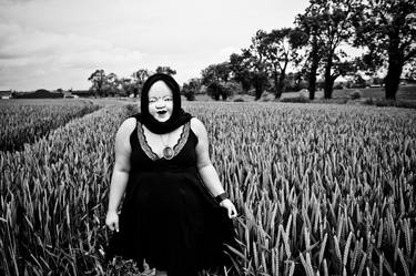 Japanese masked woman in corn field thumb