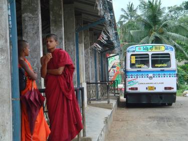 monks waiting for the bus thumb