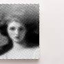 This versionn is printed on a metallic surface that is the applied on the cover of an elecytric panel with a set of magnets.
