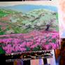 the artwork on the easel in the studio