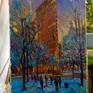 the artwork on the easel in the studio