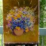 the artwork in the studio, on the easel