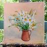 the artwork on the easel in the studio
