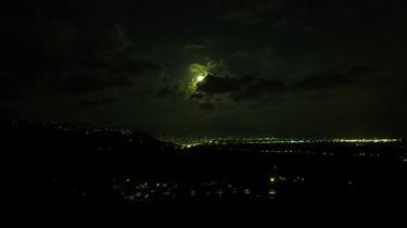 Moon in clouds over Kingston thumb