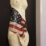 Clay sculpture nude from a woman with the American flag