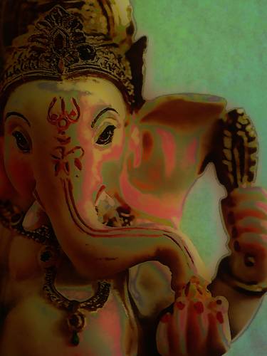 Hindu Deity Ganesh Against a Green Background thumb