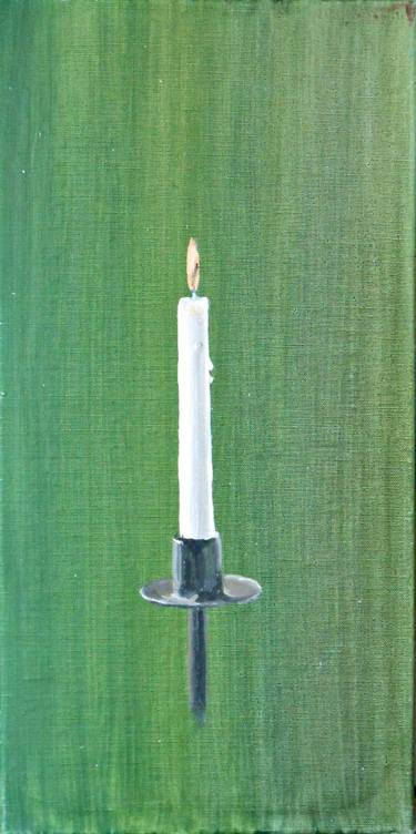 Candle in green thumb