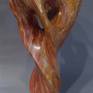 Mobius design in this gorgeous alabaster from Utah. Swirling reds and deep oranges accentuated by the fluid design. Hand carved Stone Sculpture!