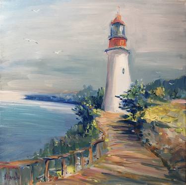 Lighthouse over northeastern coast thumb