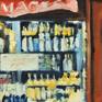 Two people looking at a shop window full of French "goodies".