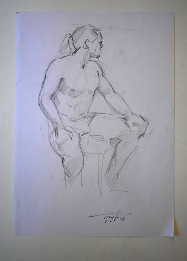 Figure of a sportish man. Sitting. thumb