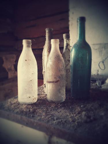 Dusty glass bottles thumb