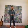 The artist with the work in the studio.