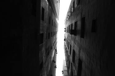 Cross long long narrow street between two buildings, then looking up - Limited Edition of 10 thumb