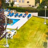 Grass by the Pool, Spain, 2020 by Gillian Westgate