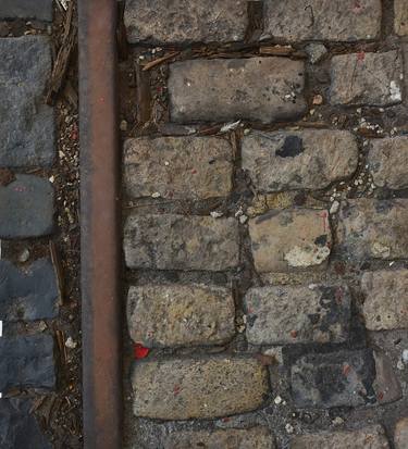 Study of a Metal Rail and Cobbles with Rust, Stones, Wood, etc. thumb